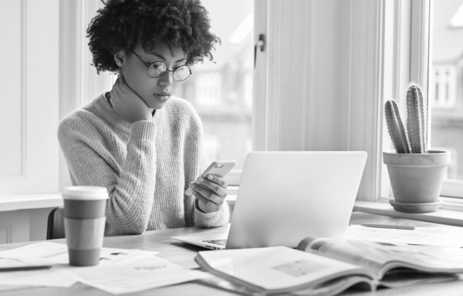 Professional reviewing emergency fund calculations and savings account options